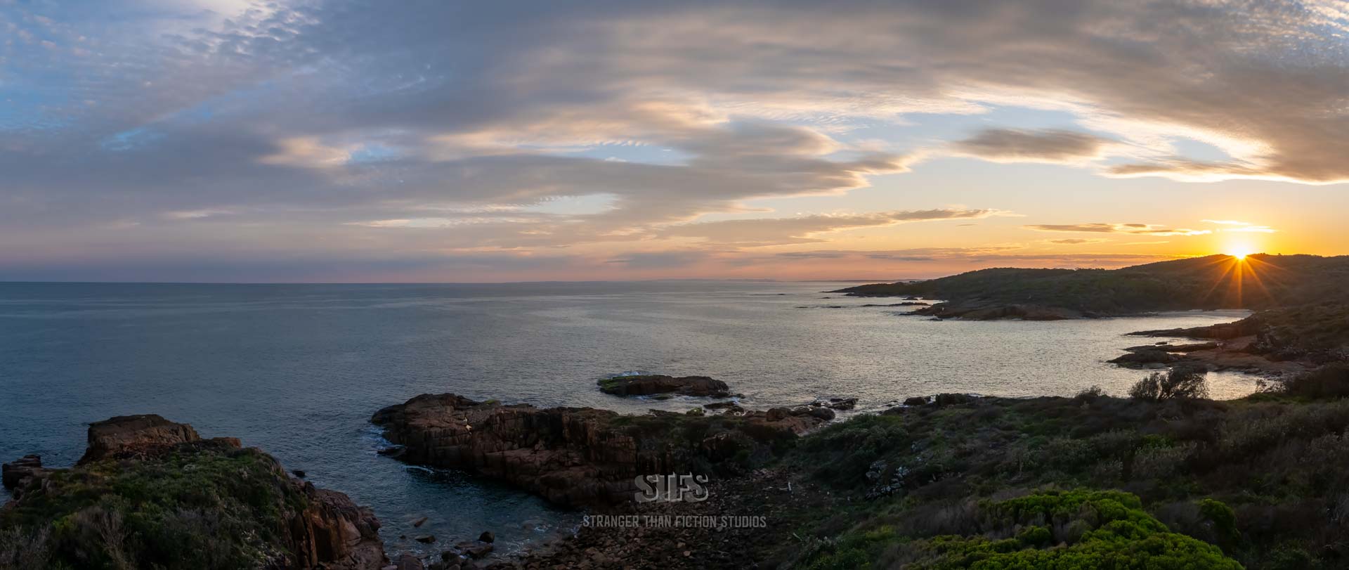 Panoramic Drone Image Of The Boat Harbopur Coastline Looking Towards Sunset Over Anna Bay In Port Stephens.