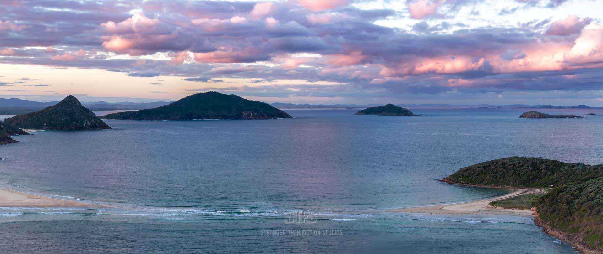 Panoramic Drone Image Of Sun Setting And Colorful Sky Over The Fingal Spit In Port Stephens NSW