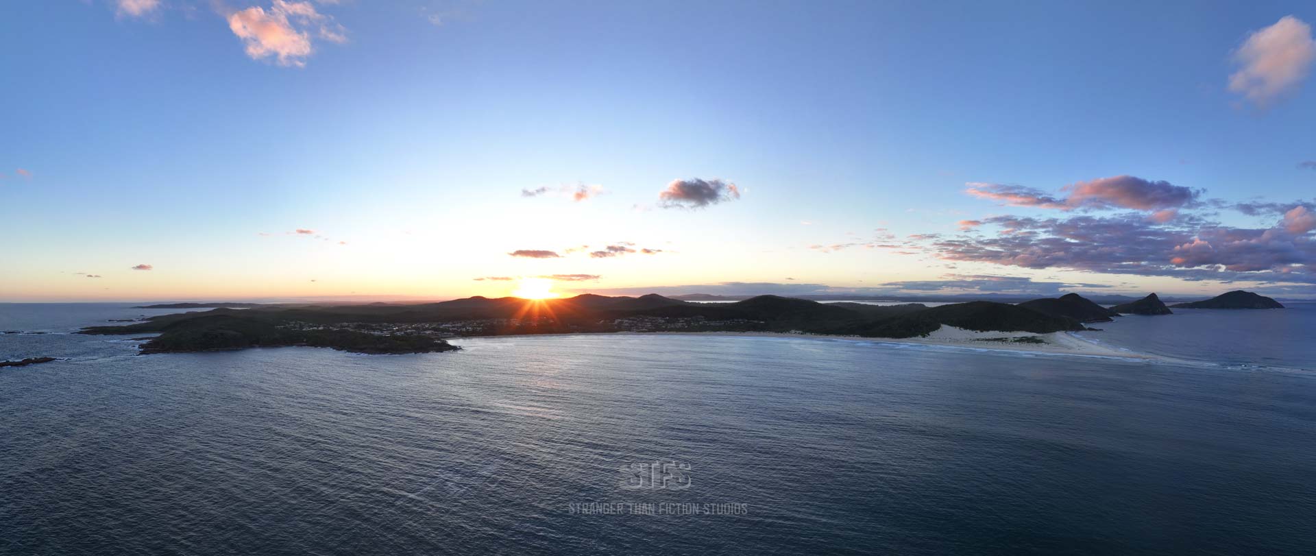 Panoramic Drone Image Of Sun Setting And Colorful Sky Over Fingal Bay In Port Stephens NSW